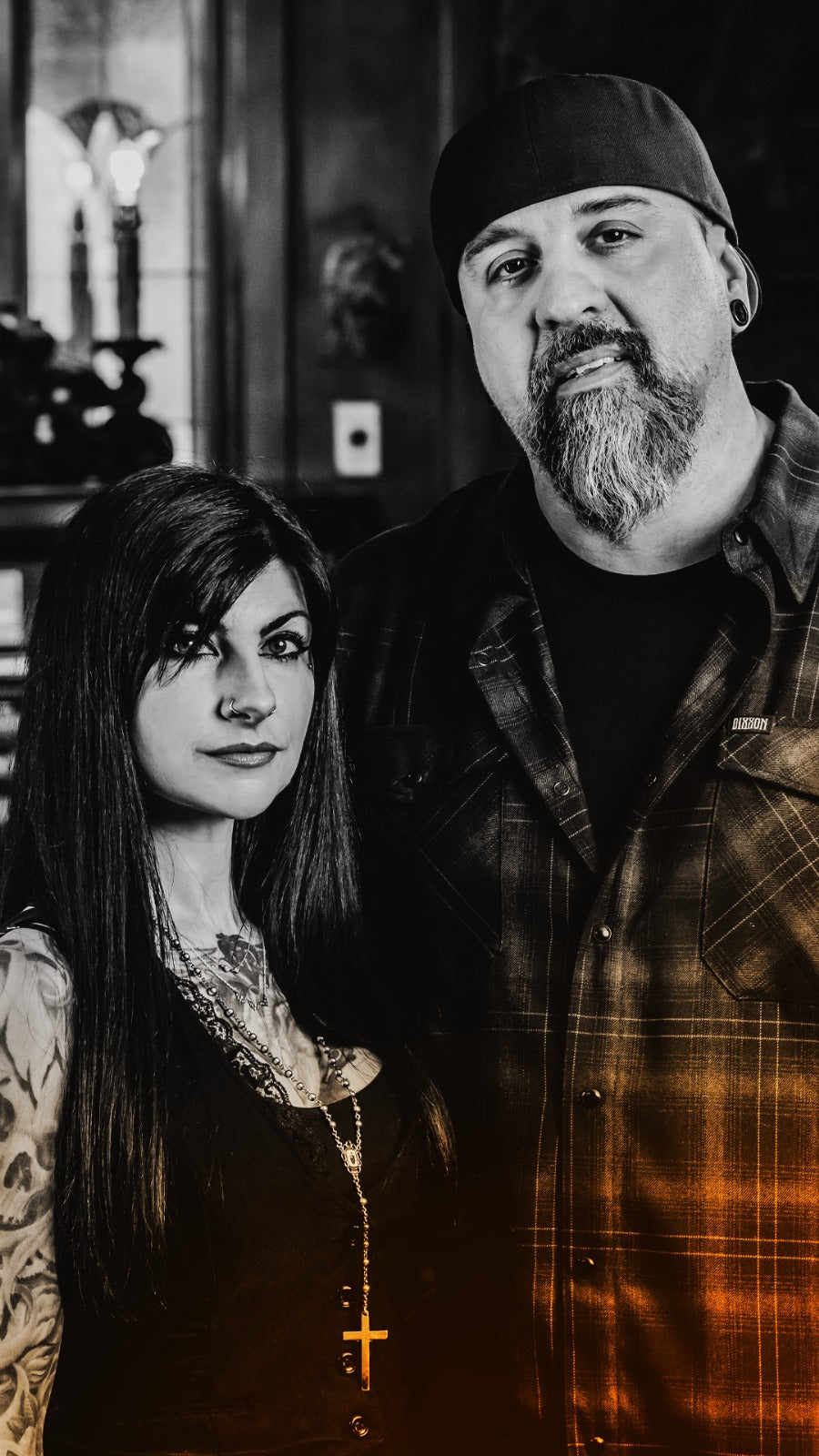 Black and white portrait of Big Chris and Q Wood of Corvus Comics, featuring dramatic lighting and confident expressions.
